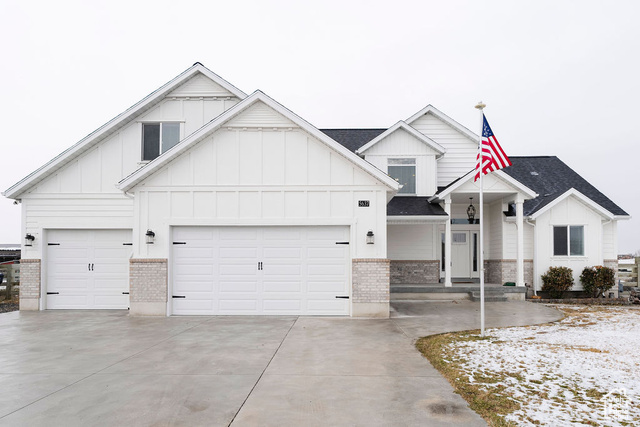 View of front of house with a garage