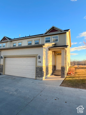 View of front of home with a garage