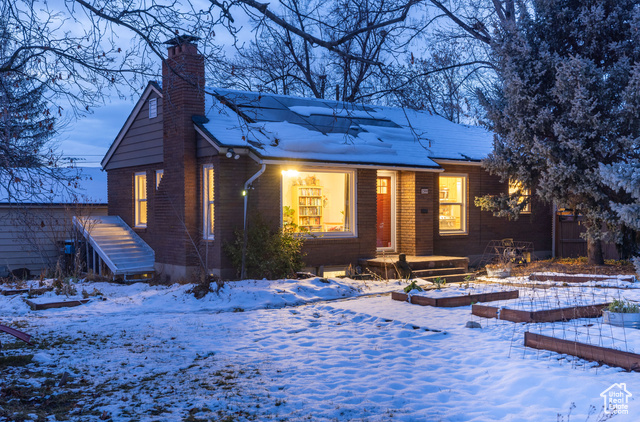 View of snow covered property