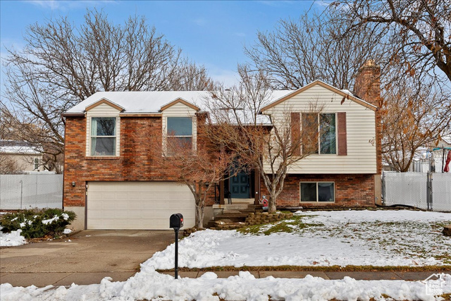 View of front of home featuring a garage