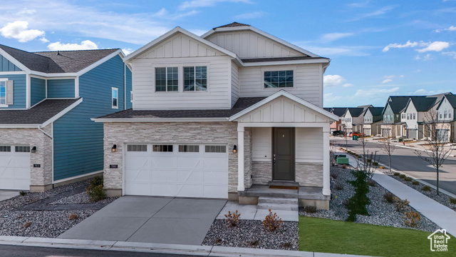 View of front facade with a garage