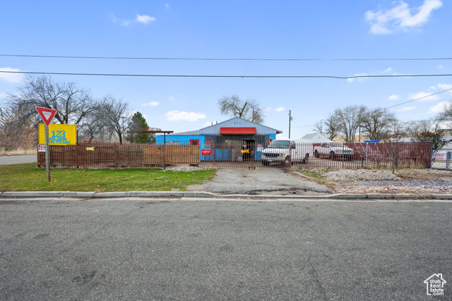 View of front of property with a front lawn