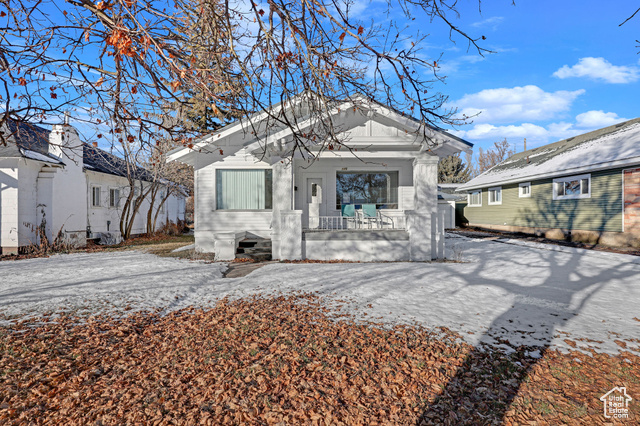 Bungalow-style house featuring a porch