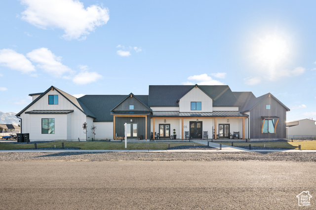 Modern farmhouse featuring french doors