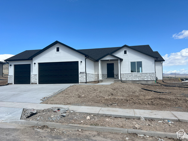 View of front facade with a garageUnder construction-This is a photos from similar model existing product may differ