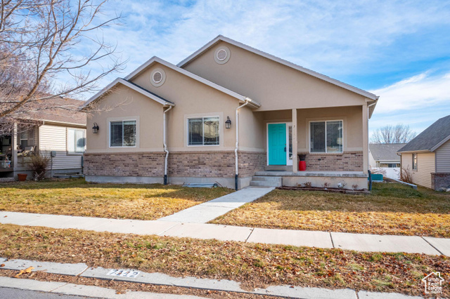 View of front of home with a front lawn