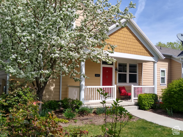 View of front of property with covered porch