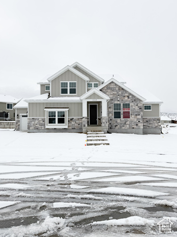 View of front of home with a garage