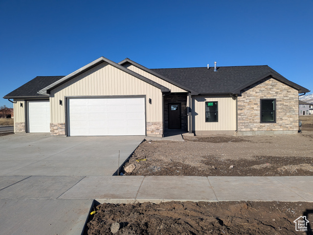 View of front of home with a garage