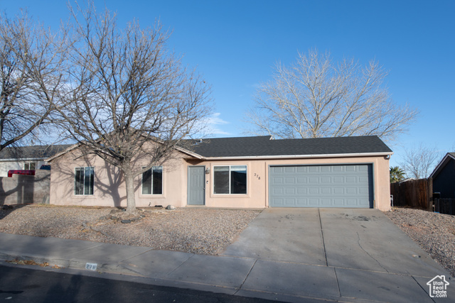 Ranch-style house with a garage