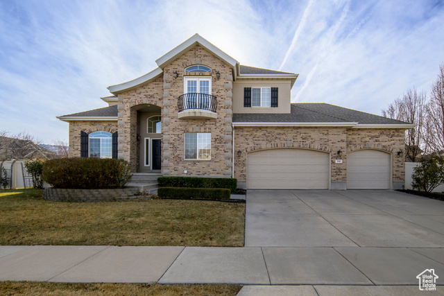 Brick 2 story home with 3 car garage