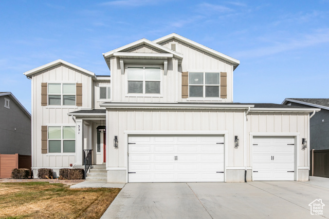 View of front facade with a garage