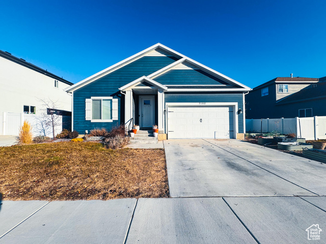 Ranch-style home with a garage