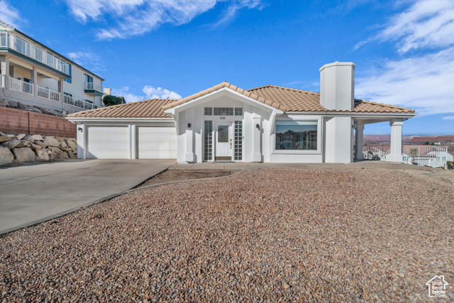 View of front of house with a garage