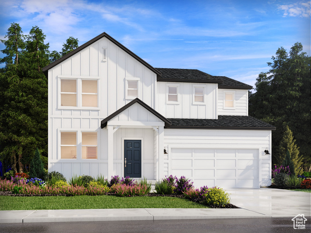 View of front of home with a garage