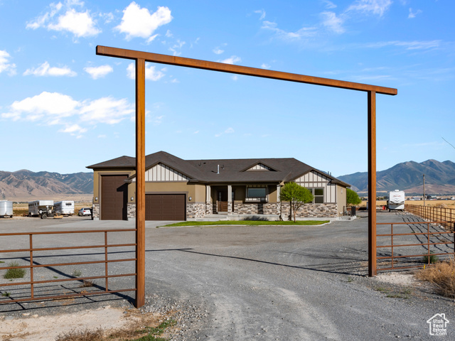 View of street with a mountain view and a rural view