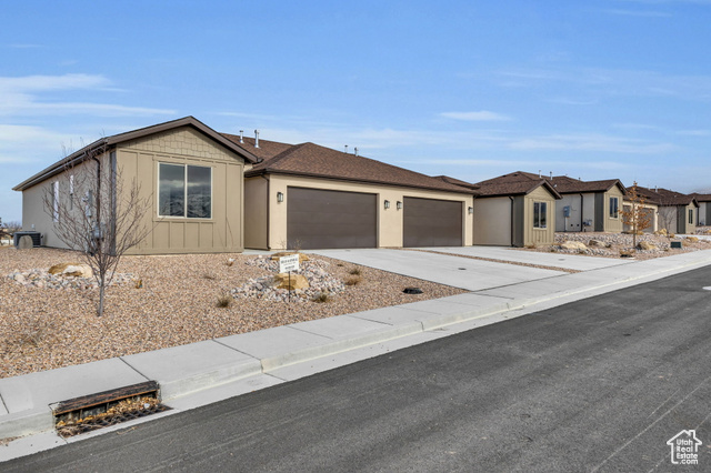 Single story home with a garage