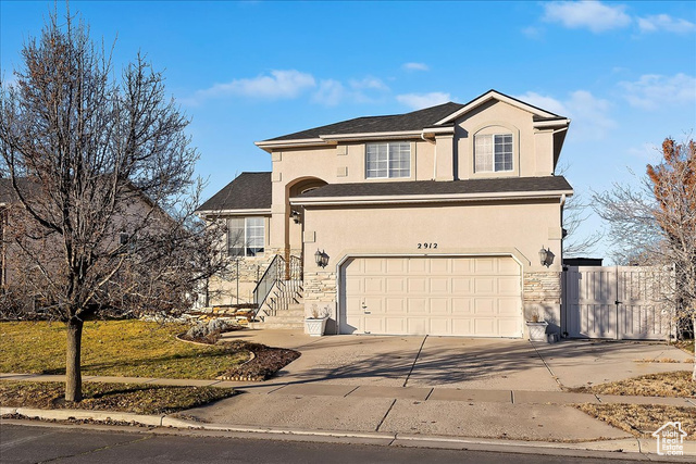 View of front facade with a garage