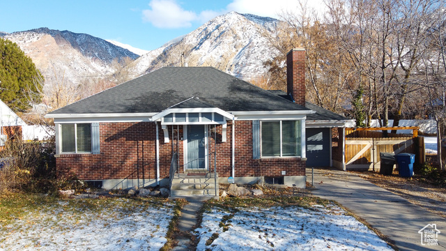 Bungalow-style home with a mountain view