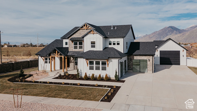 View of front of home with a mountain view