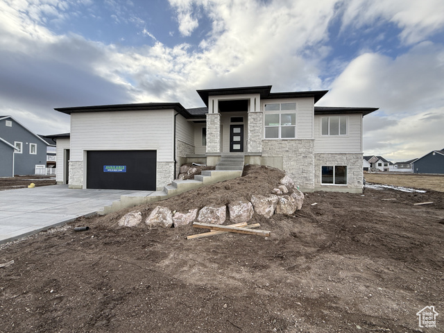 View of front of house featuring a garage