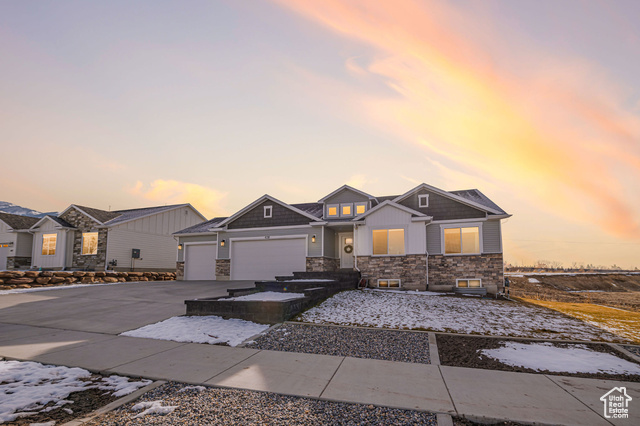 Craftsman inspired home with a 3 car garage