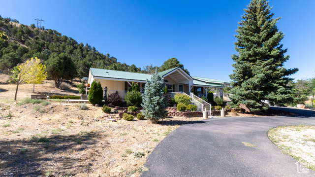 View of front of property featuring covered porch