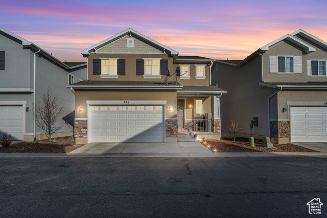 View of front of house with a garage