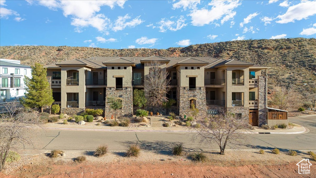 View of front of property featuring a mountain view