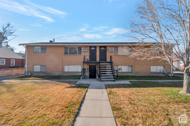 View of front of home with a front lawn