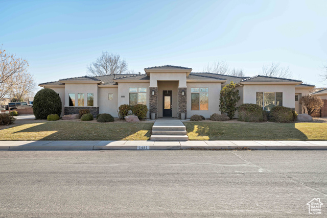 View of front of house featuring a front lawn