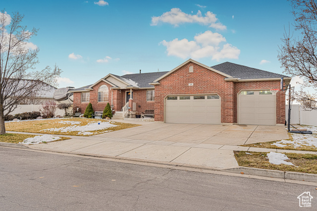 Single story home with a garage