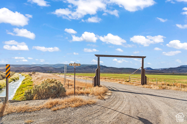 View of street with a mountain view and a rural view