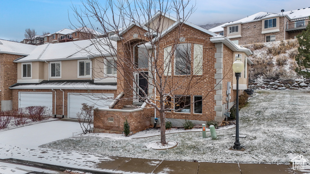 Front of property featuring a garage