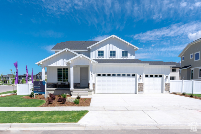 View of front of home featuring a garage