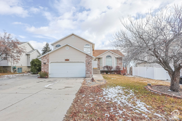 View of front of home with a garage