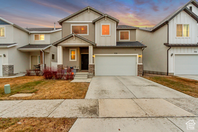 View of front of home featuring a garage