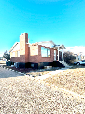 View of home's exterior with central air condition unit