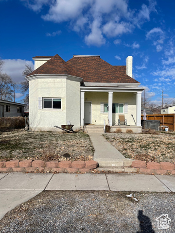 View of front of property with covered porch