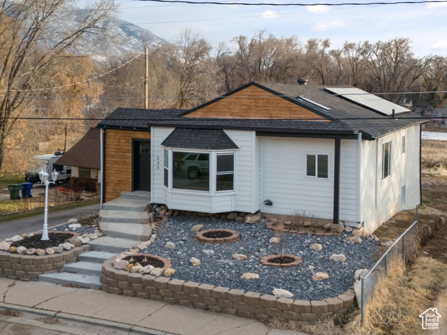 View of front of home with solar panels