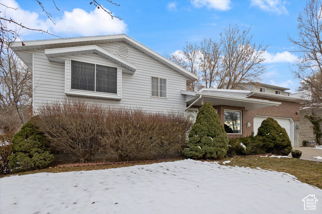 View of front facade with a garage