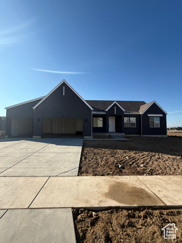 Ranch-style home featuring a carport