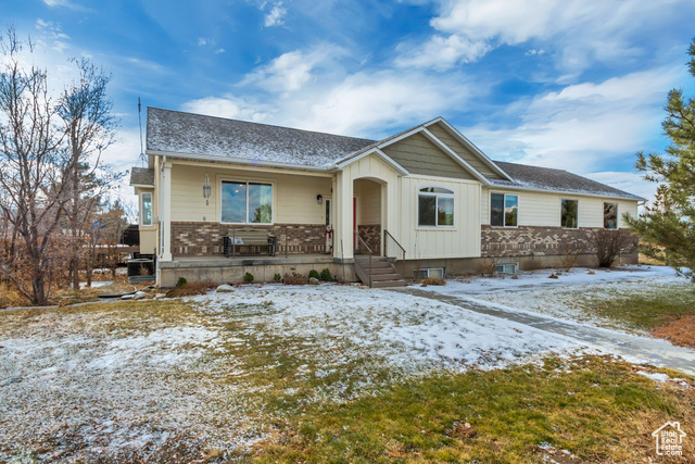 View of front of home with covered porch