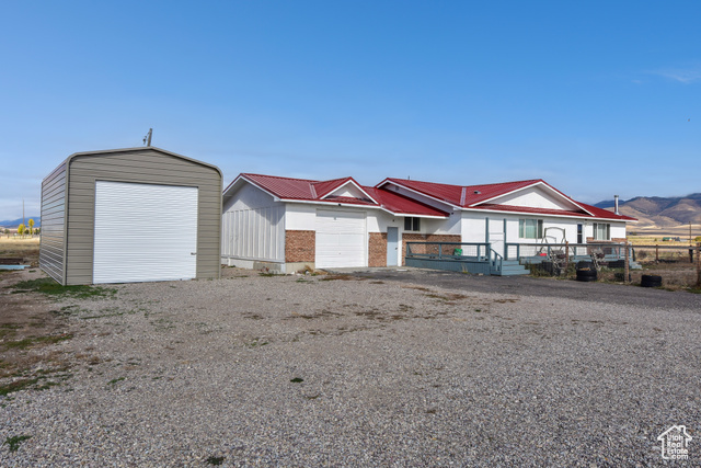 Garage featuring a mountain view