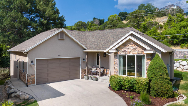 View of front of home featuring a garage