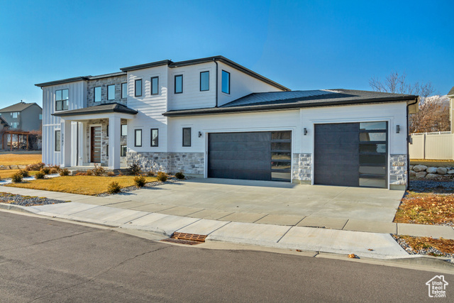 View of front of home with a garage