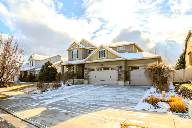 Craftsman-style home with a garage