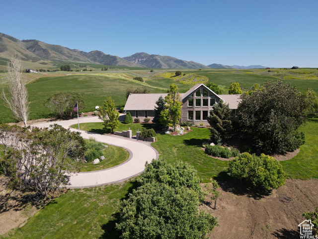 Aerial view with a rural view and a mountain view