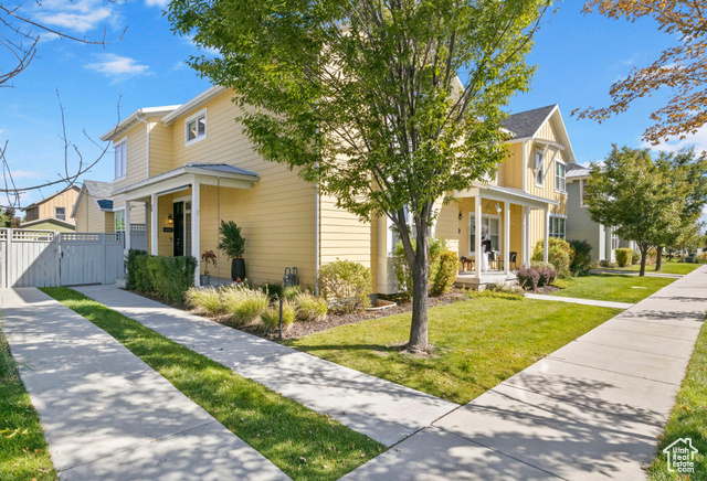 Welcome to this spacious 2,811 sq. ft. townhouse located in highly sought-after Daybreak! This beautifully maintained home features 4 bedrooms, 3.5 bathrooms, and an open floor plan. The main-floor primary suite has a walk-in closet, walk-in shower, and its own private laundry. Upstairs, you'll find two additional bedrooms, another full bathroom, and a second laundry area for added convenience. The main living area boasts a grand, open-concept kitchen and family room with soaring 25-foot ceilings, creating a sense of openness and elegance. Step outside to enjoy the private patio, perfect for relaxing in your own hot tub.