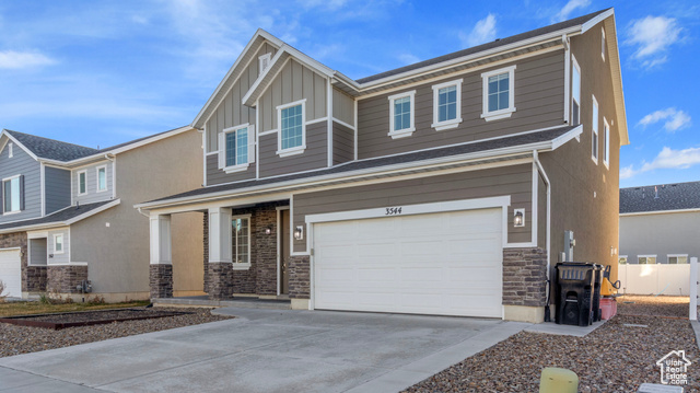 View of front of home featuring a garage